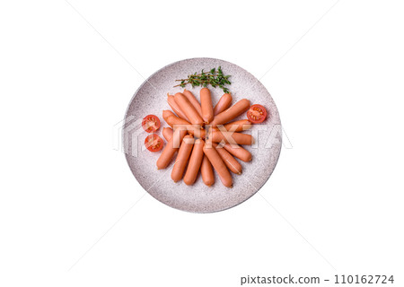Delicious small sausages with salt, spices and herbs 110162724