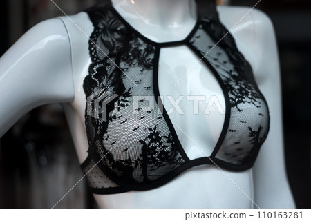 Closeup of black bra on mannequin in a fashion store showroom 110163281