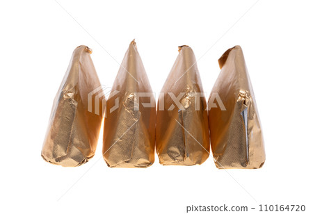 chocolate candies in foil isolated chocolate candies in foil isolated 110164720