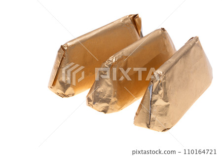 chocolate candies in foil isolated 110164721
