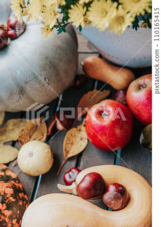 autumn harvest still life with, pumpkins, apples and chestnuts. 110165415