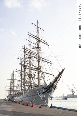 Sailing ship moored in the port 110165559