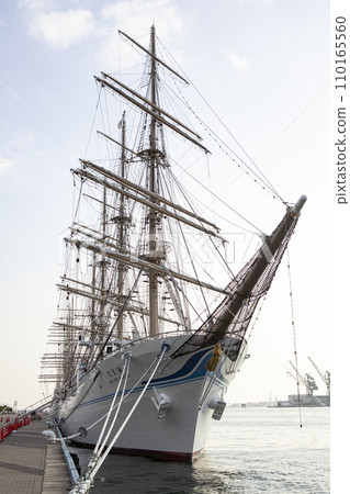 Sailing ship moored in the port 110165560