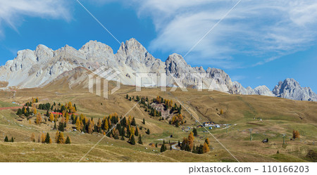 Autumn alpine mountain lake near San Pellegrino Pass, Trentino, Dolomites Alps, Italy. 110166203