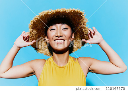 Trendy woman beauty yellow swimsuit smile summer portrait hat casual brunette fashion Trendy woman beauty yellow swimsuit smile summer portrait hat casual brunette fashion 110167370