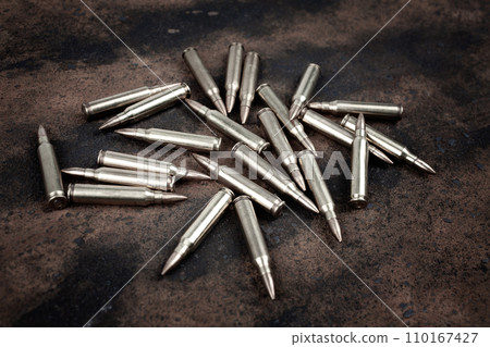 Ammunition magazine on rust metal 110167427