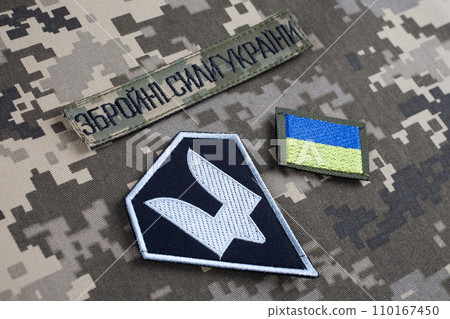 KYIV, UKRAINE - October 6, 2022. Russian invasion in Ukraine 2022. The Special Operations Forces of Ukraine Army uniform insignia badges. Text in Ukrainian - Armed Forces of Ukraine. KYIV, UKRAINE - October 6, 2022. Russian invasion in Ukraine 2022. The Special Operations Forces of Ukraine Army uniform insignia badges. Text in Ukrainian - Armed Forces of Ukraine. 110167450