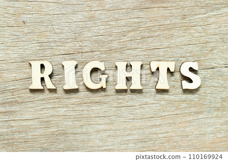Alphabet letter in word rights on wood background 110169924