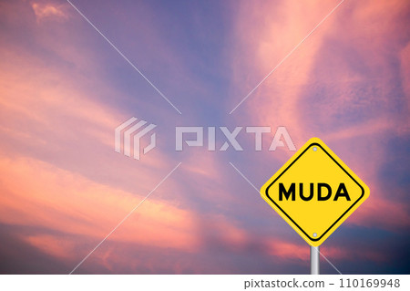Yellow transportation sign with word muda on violet color sky background 110169948