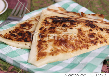 Plate of Pasta Carbonara With Italian Flat Bread on Rustic Table Plate of Pasta Carbonara With Italian Flat Bread on Rustic Table 110172634