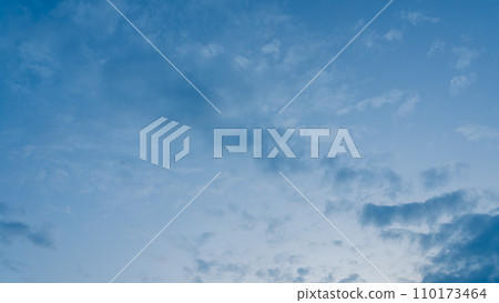 Clouds flowing in the evening sky Clouds flowing in the evening sky 110173464