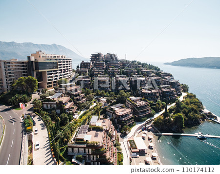 Hotel Dukley on the Zavala peninsula by the sea. Budva, Montenegro. Drone 110174112
