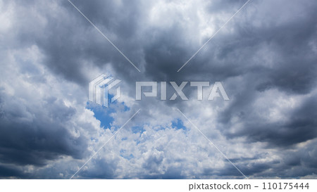 Clouds flowing in the summer blue sky 110175444