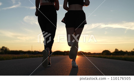 two friends running sunset, team group girls running sunset, silhouette athletic girls, teamwork training hard, goal achievement, challenging yourself, sprint endurance exercise, healthy sports two friends running sunset, team group girls running sunset, silhouette athletic girls, teamwork training hard, goal achievement, challenging yourself, sprint endurance exercise, healthy sports 110176505