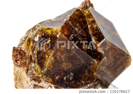 Macro stone Grossular mineral on white background 110176627