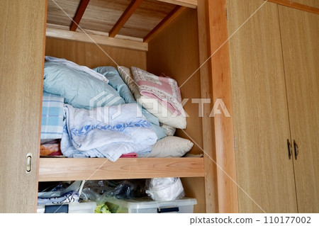 Futon in the closet 110177002