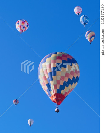 Many balloons floating in the blue sky Many balloons floating in the blue sky 110177180