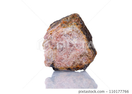 macro mineral stone Andalusite on a white background macro mineral stone Andalusite on a white background 110177766