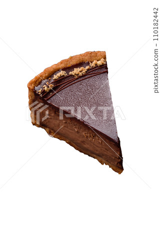 Delicious, fresh, sweet chocolate cake with nuts cut into slices Delicious, fresh, sweet chocolate cake with nuts cut into slices 110182442