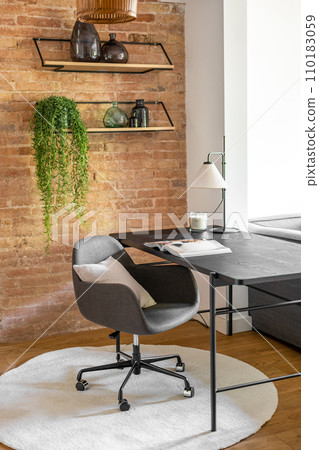 Design furniture bright work area at brick wall and pot-plant Design furniture bright work area at brick wall and pot-plant 110183059