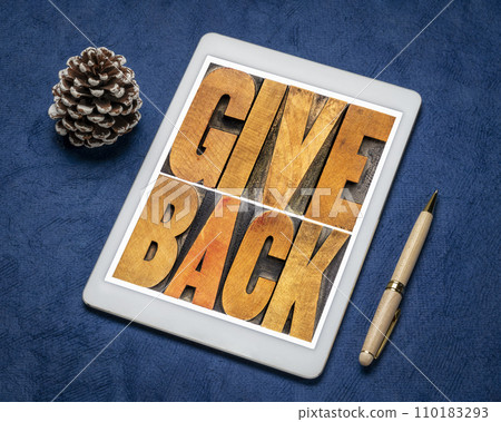 give back word abstract in vintage letterpress wood type on a digital tablet give back word abstract in vintage letterpress wood type on a digital tablet 110183293