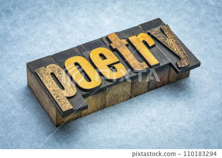 poetry word abstract - text in vintage letterpress wood type against textured paper poetry word abstract - text in vintage letterpress wood type against textured paper 110183294