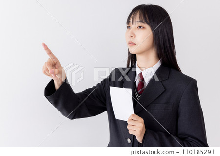 A high school girl who checks the bulletin board for the announcement of the results A high school girl who checks the bulletin board for the announcement of the results 110185291