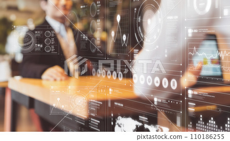 A man and a woman having a meeting and a hologram A man and a woman having a meeting and a hologram 110186255