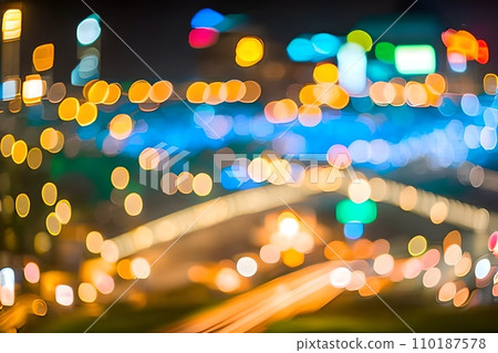 Blur or bokeh abstract lot of lighting at night city background. Out of focus dreamy busy night life effect. 110187578