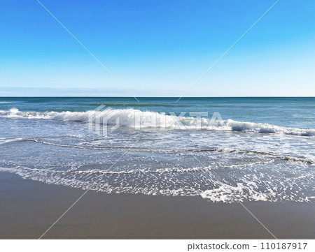 Pacific surf beach on a clear day Pacific surf beach on a clear day 110187917