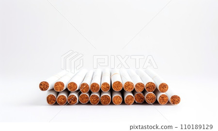 Cigarette placed on a white background Cigarette placed on a white background 110189129