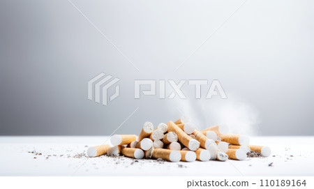 Cigarette placed on a white background 110189164