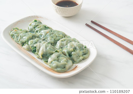 steamed chives dumplings with sauce 110189207