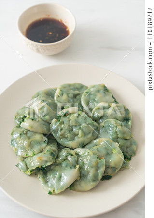steamed chives dumplings with sauce steamed chives dumplings with sauce 110189212