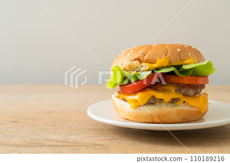 pork burger with cheese on plate 110189216
