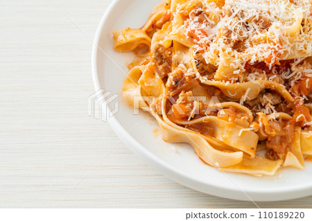Homemade pasta fettuccine bolognese with cheese Homemade pasta fettuccine bolognese with cheese 110189220