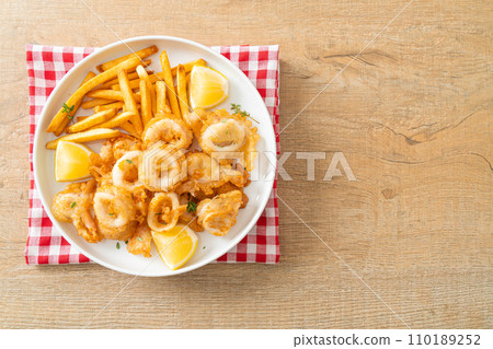 calamari - fried squid or octopus with fries calamari - fried squid or octopus with fries 110189252