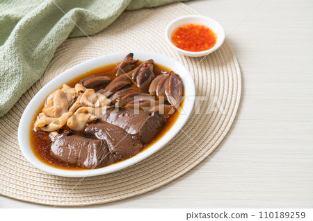 stewed duck offal in brown soup stewed duck offal in brown soup 110189259