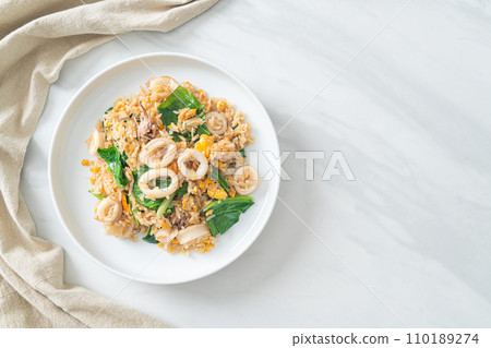 Fried rice with squid or octopus Fried rice with squid or octopus 110189274