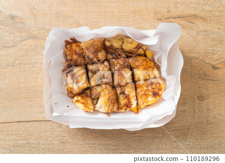 roti with egg, banana and chocolate 110189296