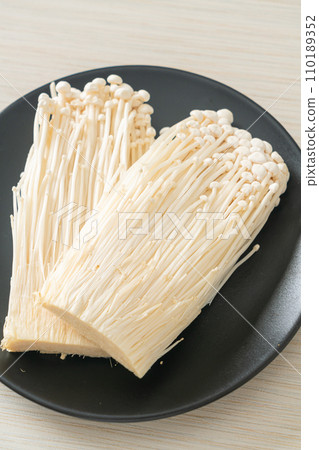fresh enoki mushroom or golden needle mushrooms 110189352