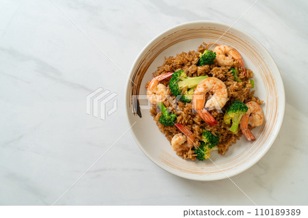 fried rice with broccoli and shrimps 110189389
