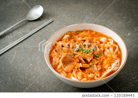 Korean udon ramen noodles with pork in kimchi soup Korean udon ramen noodles with pork in kimchi soup 110189445
