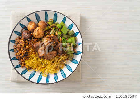 dried egg noodle with pork and meatball 110189597