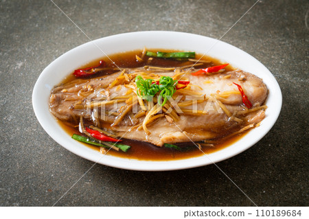 Steamed Fish with Soy Sauce 110189684
