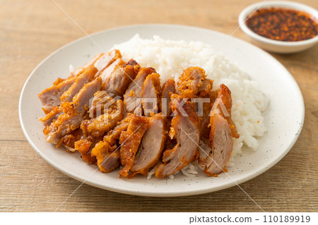 fried pork topped rice with dipping sauce fried pork topped rice with dipping sauce 110189919