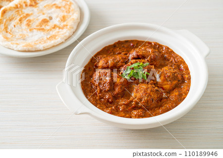 chicken tikka masala spicy curry meat food with roti or naan bread chicken tikka masala spicy curry meat food with roti or naan bread 110189946