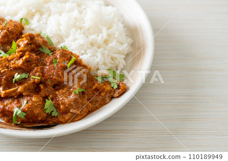 chicken tikka masala with rice on plate chicken tikka masala with rice on plate 110189949