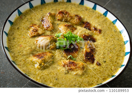 Afghani chicken in green curry or Hariyali tikka chicken hara masala 110189953