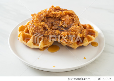 fried chicken waffle with honey or maple syrup 110190006